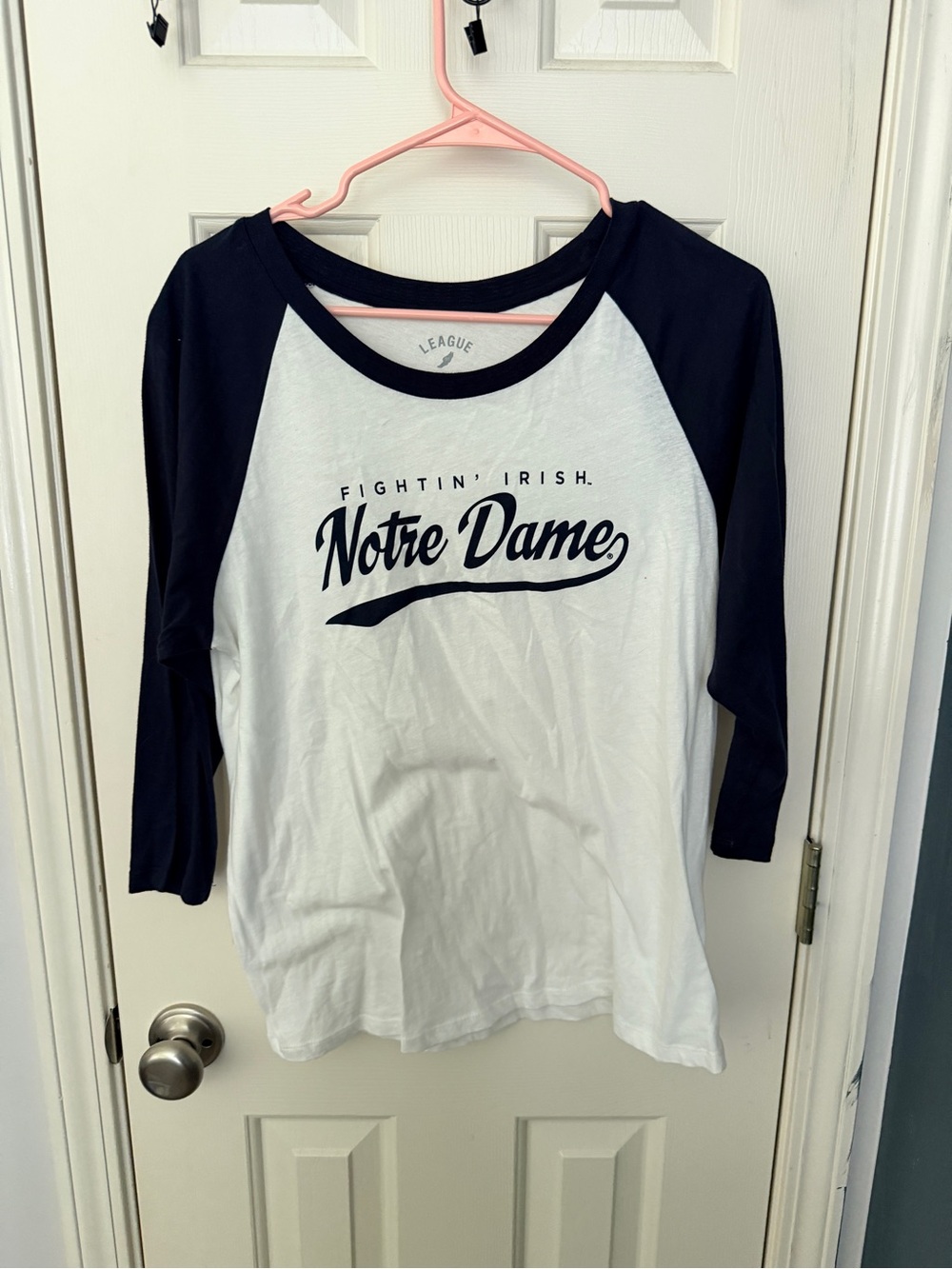 League White Tee with Navy Trim and Script Logo